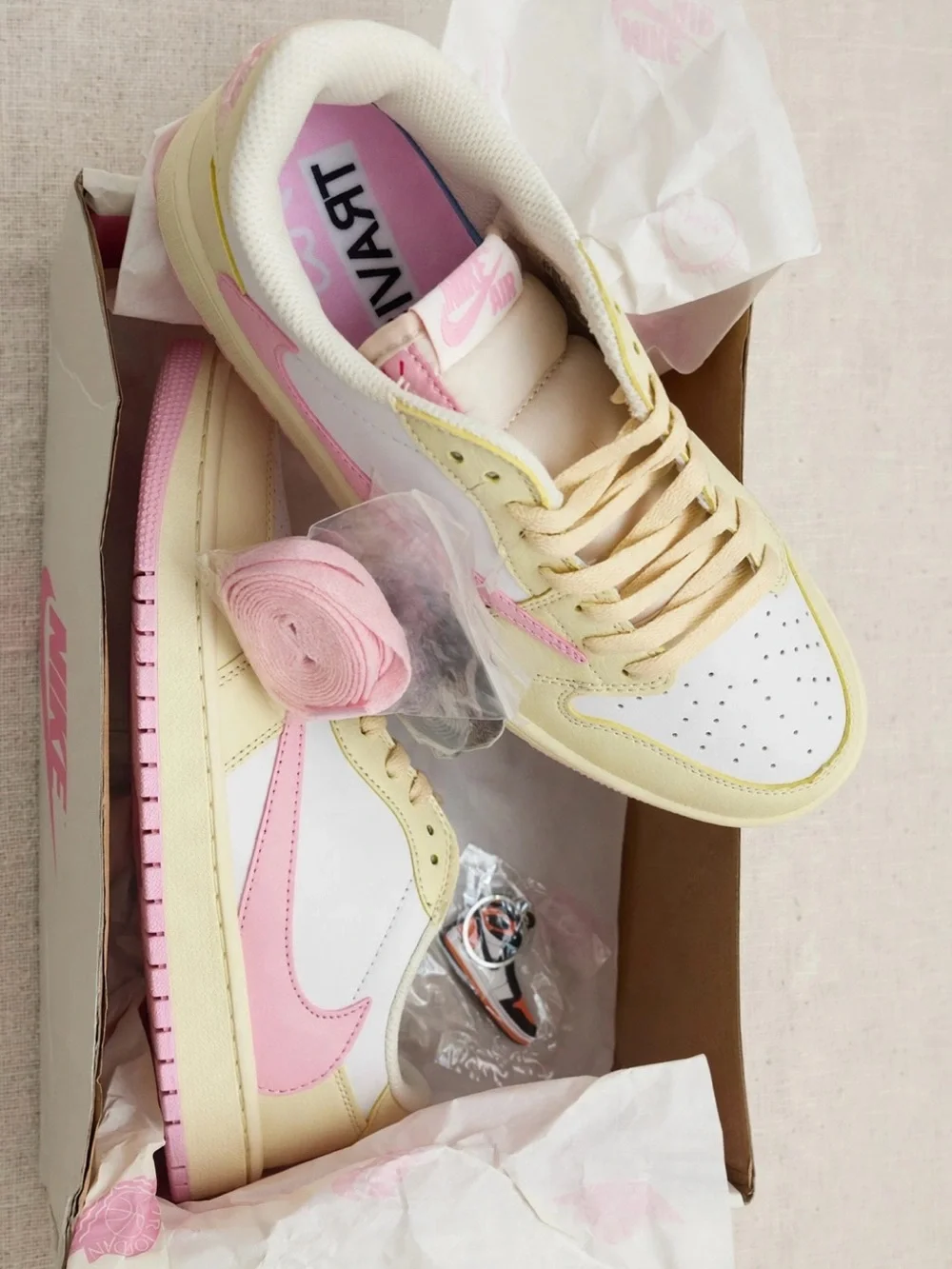 Jordan Low-Top Sneakers in Cream, Pink, and White